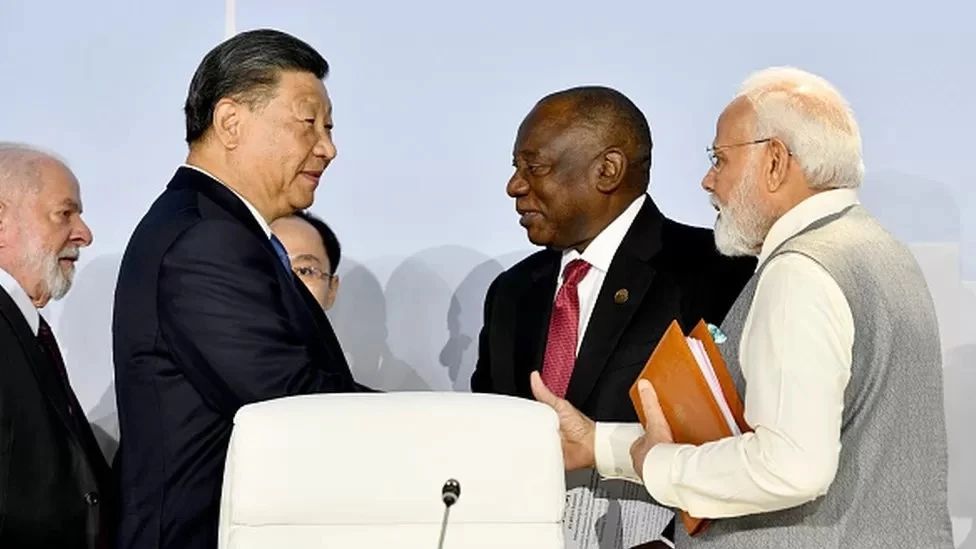 8月23日，印度总理莫迪和中国国家主席习近平参加金砖国家领导人第十五次会晤。